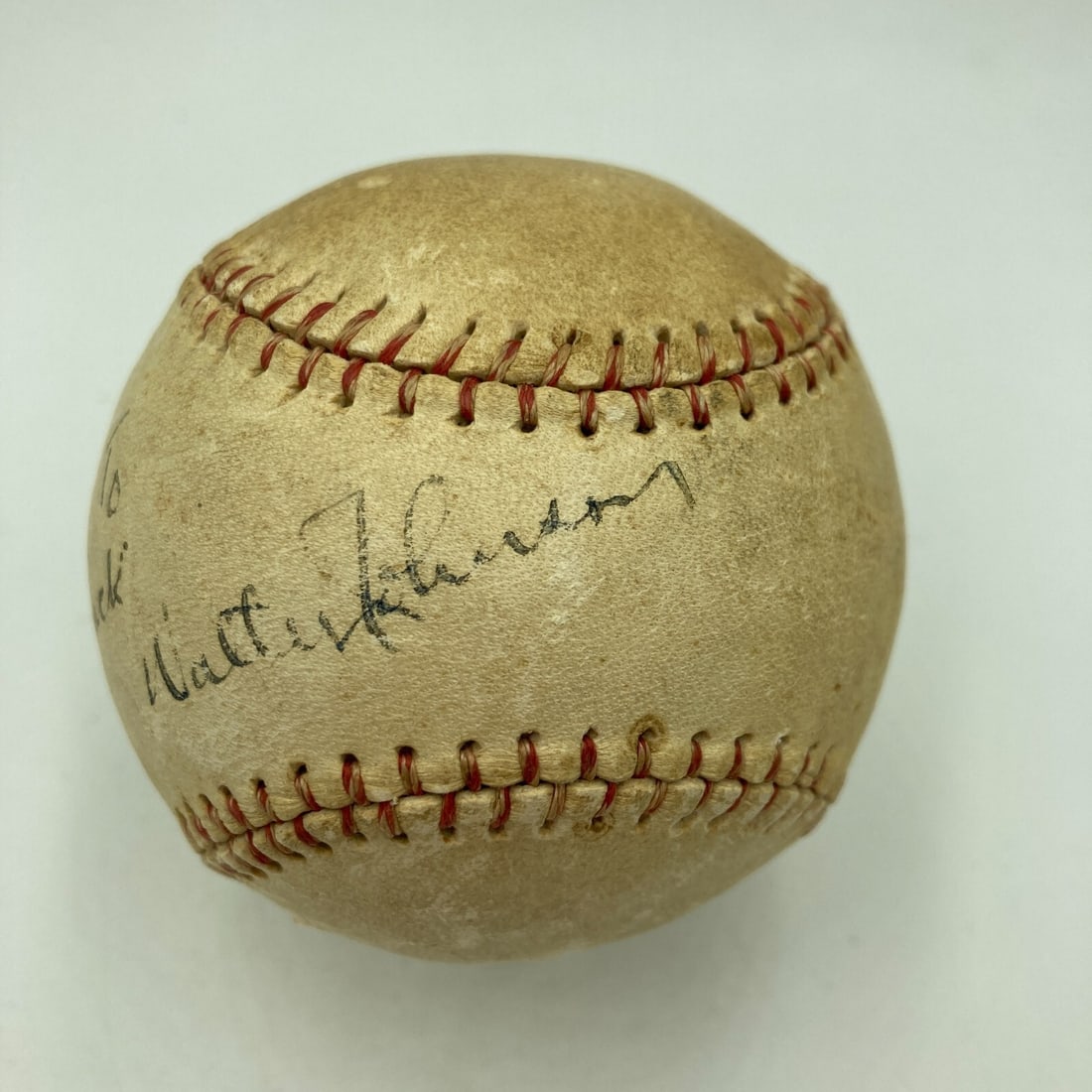 Walter Johnson Signed Baseball with JSA Certificate 1920s: Walter Johnson Signed Baseball with JSA Certificate 1920s This is an original single signed baseball by Hall of Famer Walter Johnson, dating back to the 1920s. The ball features a vibrant blue fountai
