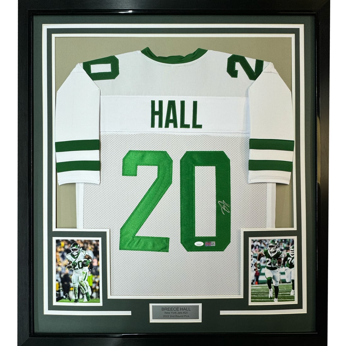 Breece Hall Signed New York Jersey Framed 35x39 JSA Authenticated: Breece Hall Signed New York Jersey Framed 35x39 JSA Authenticated This professionally framed New York Jets white jersey features the authentic signature of Breece Hall. The jersey is authenticated by 