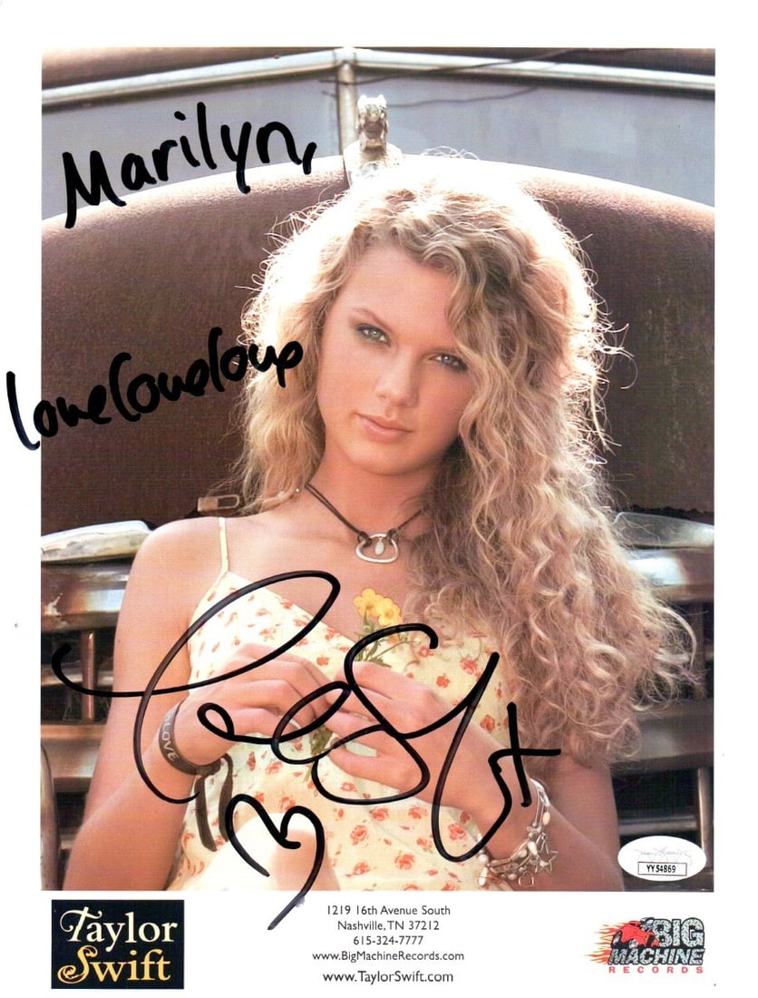 Taylor Swift Signed 8.5x11 Photo To Marilyn JSA Authenticated: Taylor Swift Signed 8.5x11 Photo To Marilyn JSA Authenticated Capture a piece of music history with this authentic Taylor Swift signed 8.5x11 photo, personally dedicated "To Marilyn." This unique item