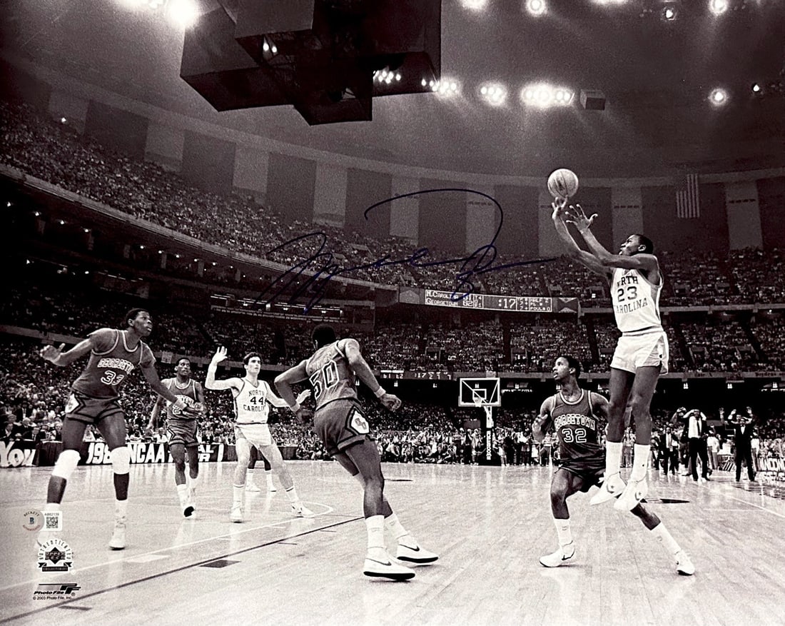 Michael Jordan Signed 16x20 UNC Photo Auto 9 Beckett LOA: Michael Jordan Signed 16x20 UNC Photo Auto 9 Beckett LOA This iconic 16x20 photograph captures Michael Jordan during his legendary 1982 NCAA Championship Game against Georgetown, where he made the piv