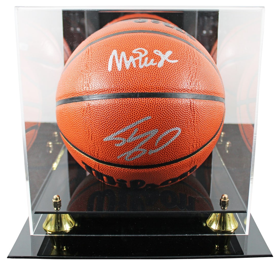 Wilson Basketball Signed by Magic Johnson and Shaquille O'Neal With BAS Case: Wilson Basketball Signed by Magic Johnson and Shaquille O'Neal With BAS Case This Wilson indoor/outdoor basketball features silver signatures from Magic Johnson and Shaquille O'Neal of the Los Angeles