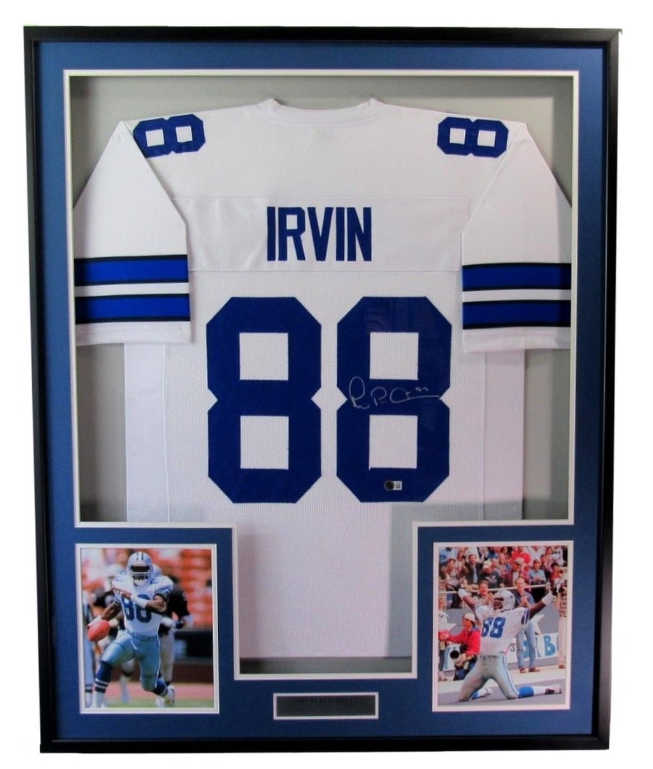 Framed Michael Irvin Signed Dallas Cowboys Jersey with Beckett Authentication: Framed Michael Irvin Signed Dallas Cowboys Jersey with Beckett Authentication Showcase your love for the Dallas Cowboys with this Michael Irvin Hall of Fame Autographed Custom Jersey. This Navy jersey