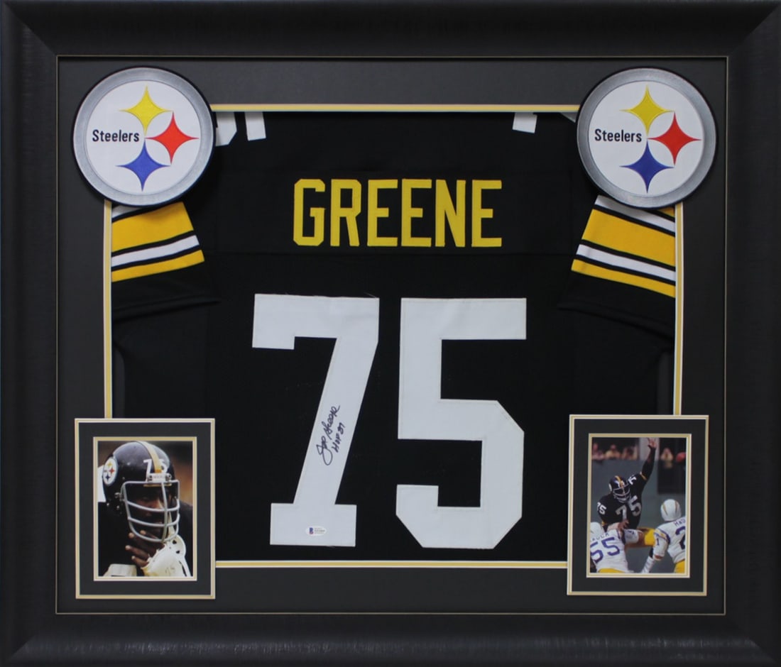 Framed Joe Greene signed black Steelers jersey HOF 87 Beckett witnessed: Framed Joe Greene signed black Steelers jersey HOF 87 Beckett witnessed Autographed black pro style framed jersey signed by Joe Greene with the inscription "HOF 87". It is an original signed item feat