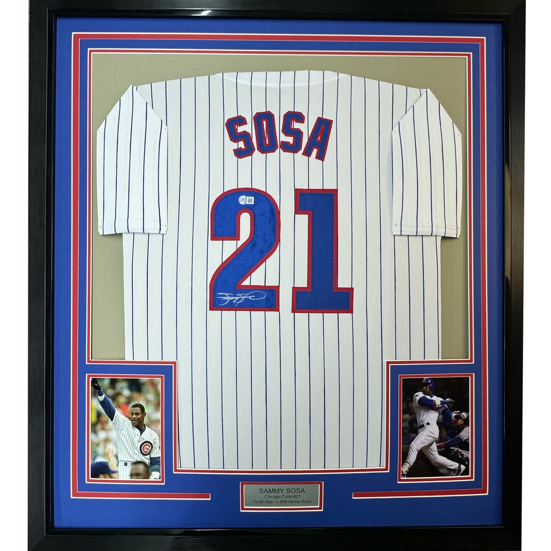 Sammy Sosa Signed Chicago Cubs Pinstripe Jersey Framed with JSA COA: Sammy Sosa Signed Chicago Cubs Pinstripe Jersey Framed with JSA COA This framed Chicago Cubs pinstripe jersey is autographed by Sammy Sosa and comes with a Beckett Certificate of Authenticity. The jer