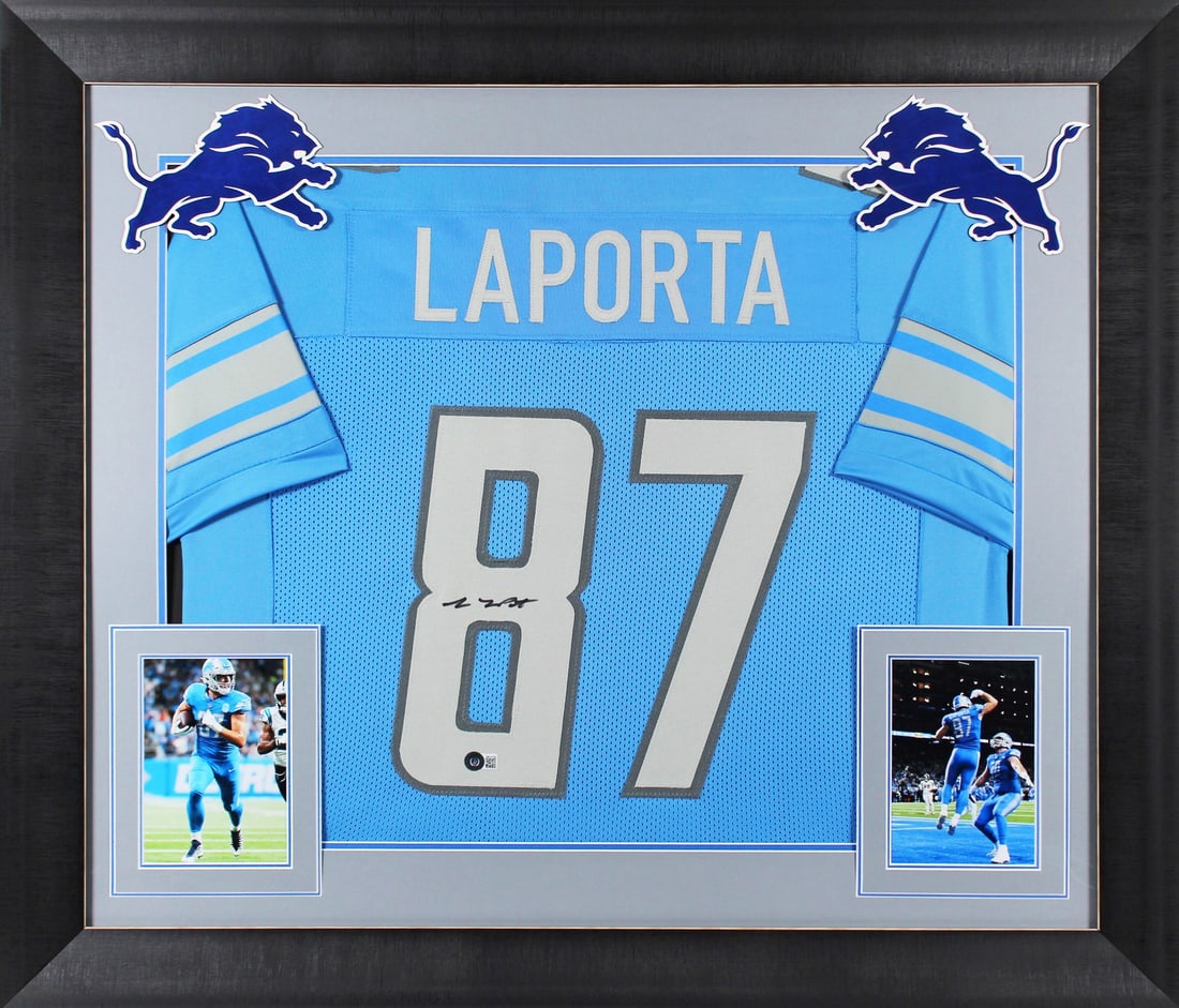 Framed Blue Jersey Signed by Sam Laporta BAS Authenticated: Framed Blue Jersey Signed by Sam Laporta BAS Authenticated Autographed blue pro style framed jersey personally signed by Sam LaPorta of the Detroit Lions. The item is an original, hand-signed piece wi