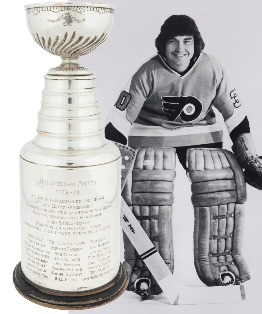 Stanley Cup Mini Trophy Awarded to Bobby Chief Taylor Philadelphia Flyers 1973-74: Stanley Cup Mini Trophy Awarded to Bobby Chief Taylor Philadelphia Flyers 1973-74 This is a 1973-74 Philadelphia Flyers Stanley Cup trophy that was presented to Bobby "Chief" Taylor, a member of the c