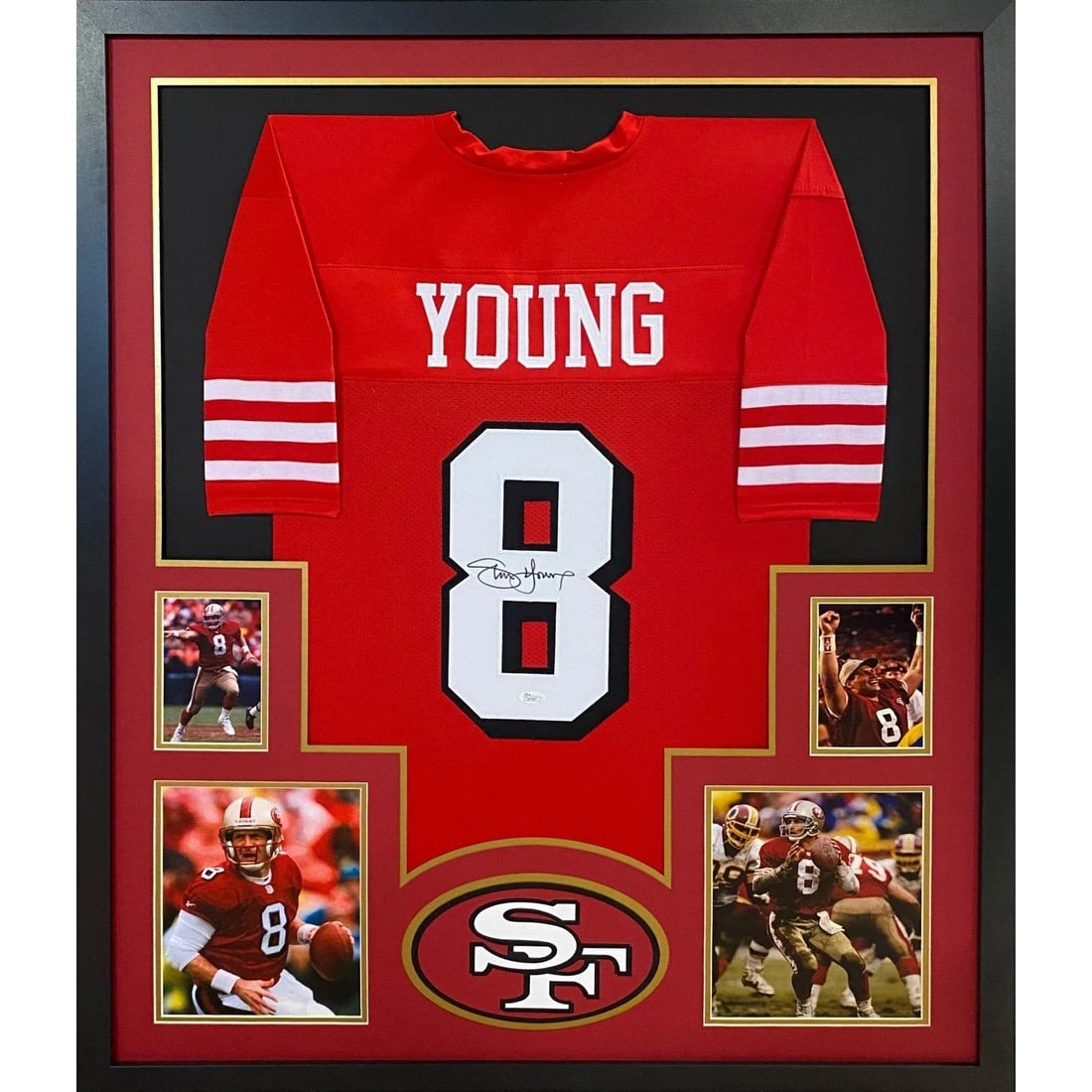 Framed San Francisco 49ers Red Jersey Signed by Steve Young with JSA Authentication: Framed San Francisco 49ers Red Jersey Signed by Steve Young with JSA Authentication This framed red San Francisco 49ers jersey is autographed by Steve Young and includes authentication by JSA with a t