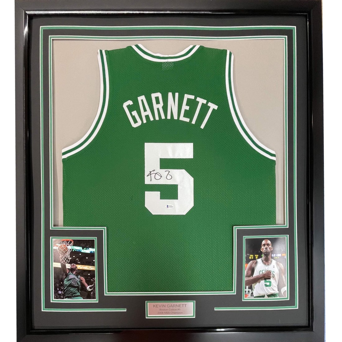 Framed Kevin Garnett signed Boston Celtics jersey Beckett COA 33x42: Framed Kevin Garnett signed Boston Celtics jersey Beckett COA 33x42 This framed Kevin Garnett Boston Celtics green jersey features a genuine autograph and comes with Beckett Grading Services authentic