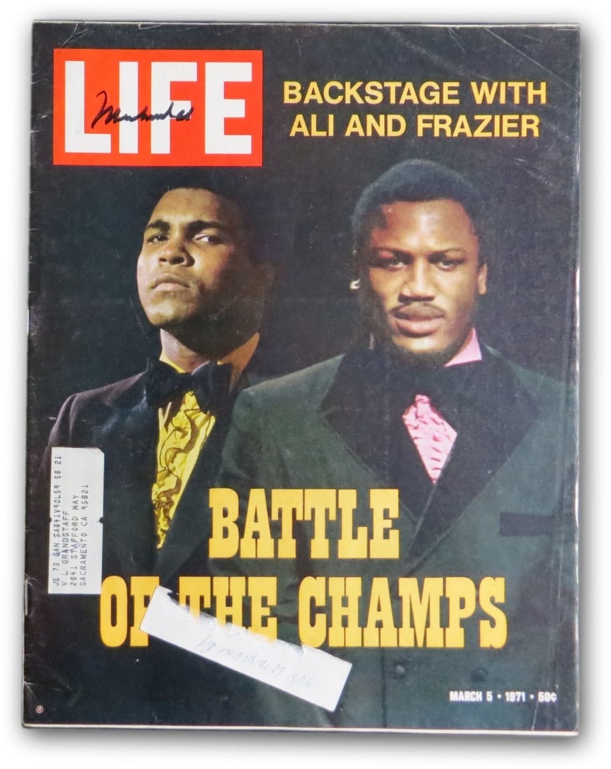 Muhammad Ali Signed LIFE Magazine 3/5/71 Authenticated by Online Authentics: Muhammad Ali Signed LIFE Magazine 3/5/71 Authenticated by Online Authentics This original LIFE magazine, dated March 5, 1971, features a striking cover story on Muhammad Ali, famously signed by the