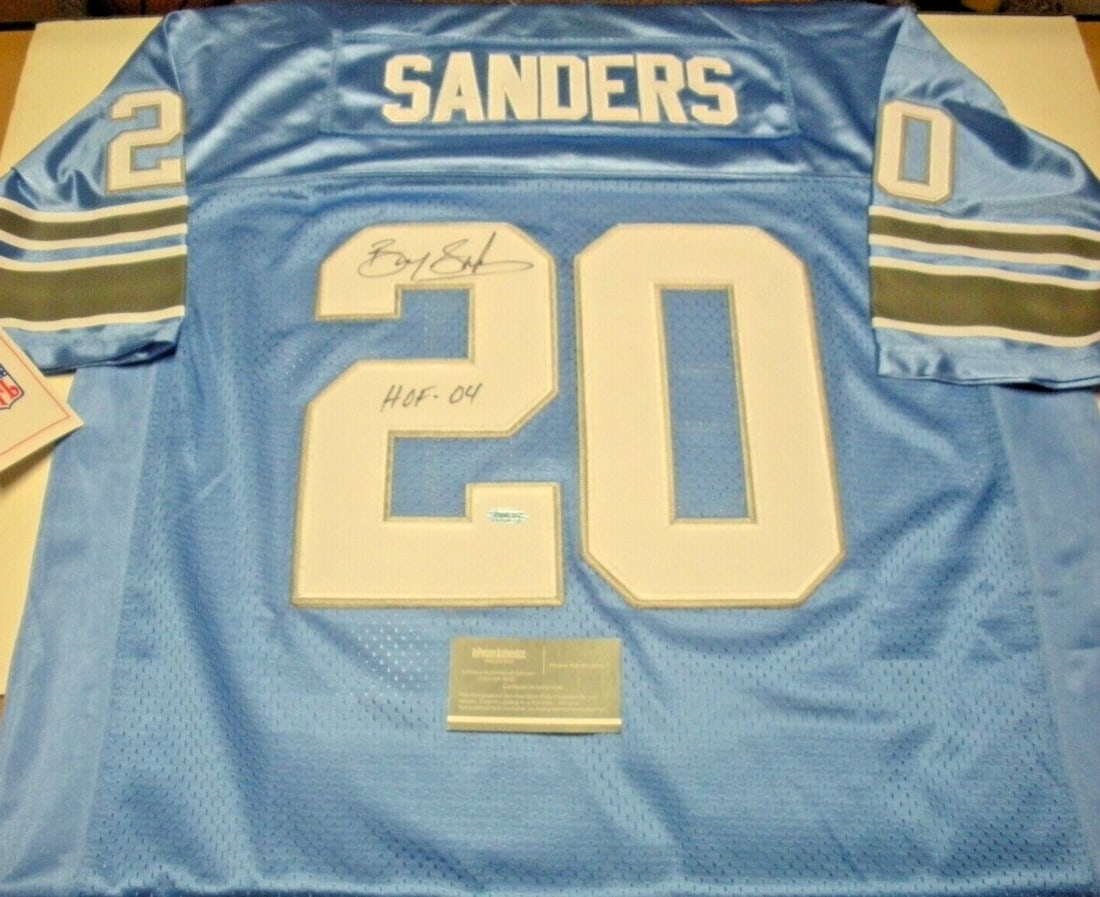 Signed Mitchell and Ness Detroit Lions Jersey Barry Sanders with COA: Signed Mitchell and Ness Detroit Lions Jersey Barry Sanders with COA This is a Mitchell & Ness officially licensed Detroit Lions jersey autographed by Barry Sanders. The jersey comes with a Certificat