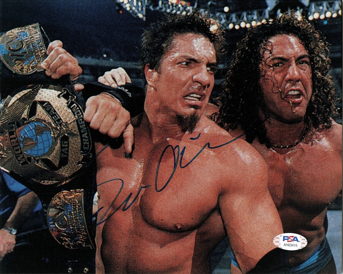 Sean O'Haire WWE 8x10 Signed Photo PSA/DNA Authenticated: Sean O'Haire WWE 8x10 Signed Photo PSA/DNA Authenticated This is an authentic 8x10 photograph signed by Sean O'Haire, a notable WWE wrestler. The autograph has been verified by PSA/DNA, ensuring its l