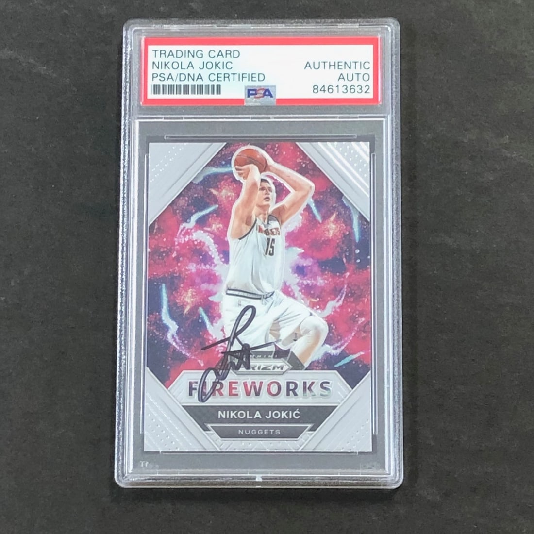 2020-21 Panini Prizm Fireworks #7 Nikola Jokic Signed Card PSA Authenticated: 2020-21 Panini Prizm Fireworks #7 Nikola Jokic Signed Card PSA Authenticated This listing features a 2020-21 Panini Prizm Fireworks #7 basketball card signed by Nikola Jokic of the Denver Nuggets. The