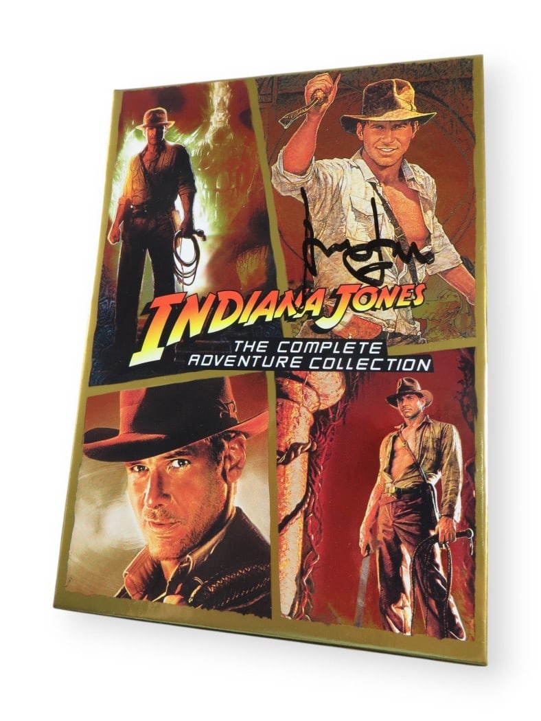Harrison Ford Signed Indiana Jones DVD Cover Beckett Authenticated: Harrison Ford Signed Indiana Jones DVD Cover Beckett Authenticated This original DVD cover from the Indiana Jones Collection features a stunning autograph by the legendary actor Harrison Ford. Please 