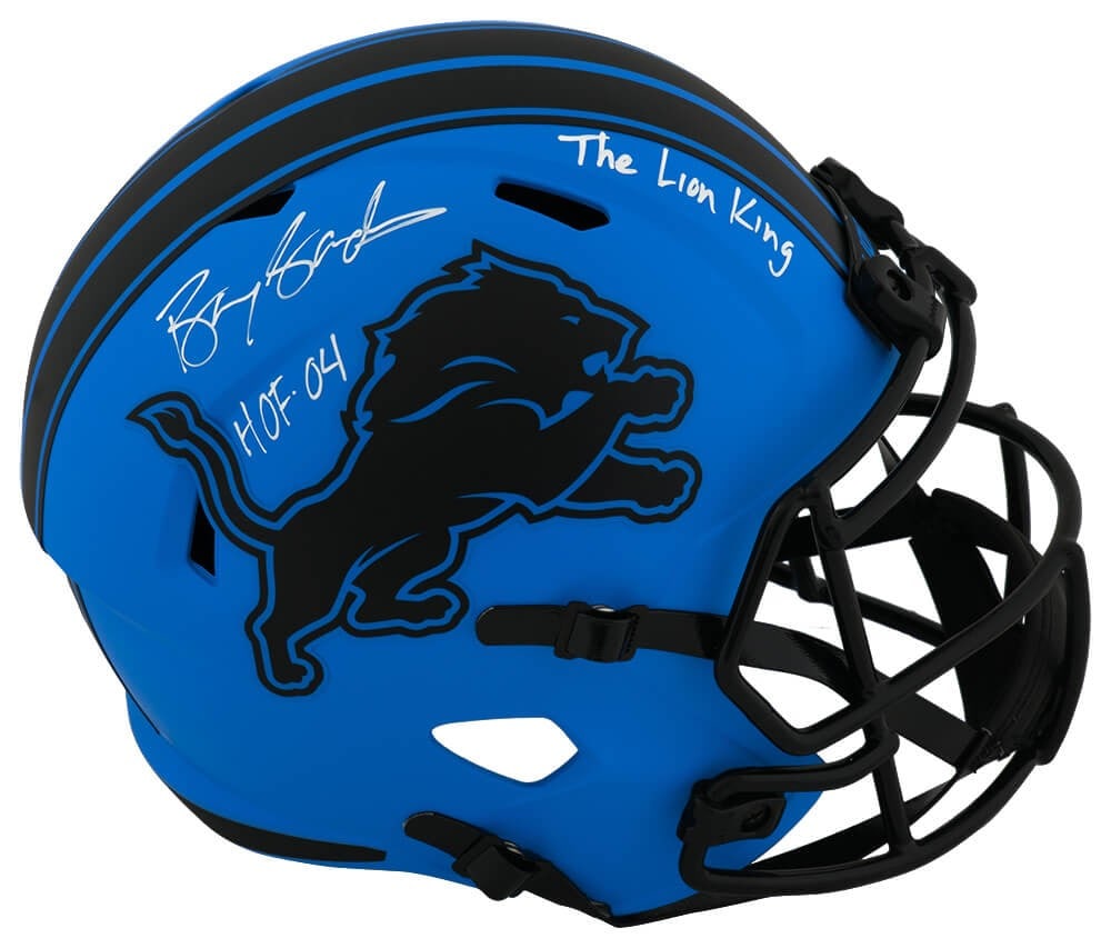 Barry Sanders Signed Lions Riddell Full Size Helmet with HOF 04 Inscription: Barry Sanders Signed Lions Riddell Full Size Helmet with HOF 04 Inscription This is a Barry Sanders signed Detroit Lions RAVE Riddell full-size speed replica helmet. It features notable inscriptions i