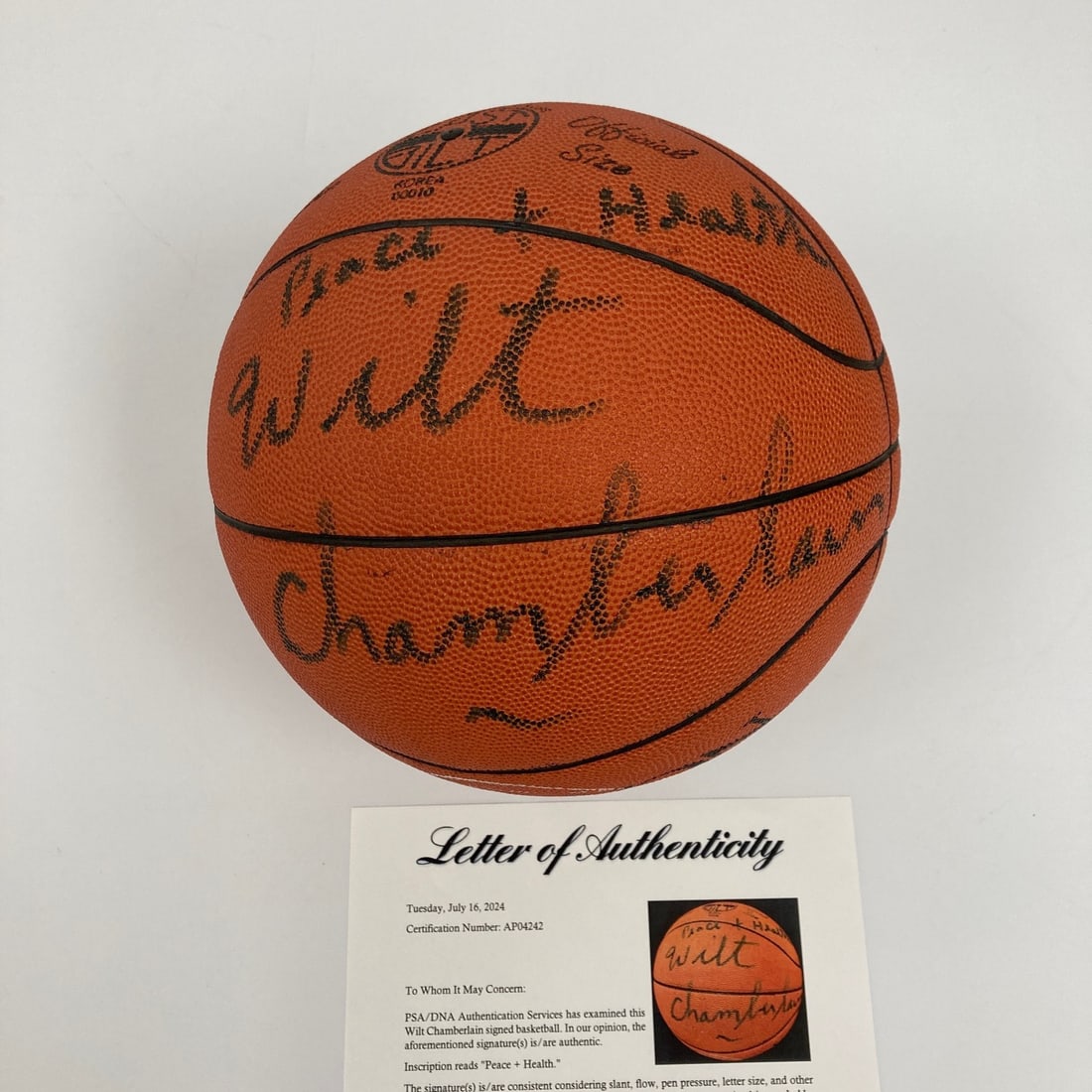 Rawlings leather basketball signed by Wilt Chamberlain Peace Health PSA BAS: Rawlings leather basketball signed by Wilt Chamberlain Peace Health PSA BAS This vintage Rawlings leather basketball features a bold signature and the inscription "Peace & Health" from basketball lege