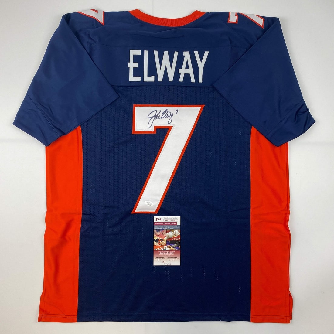 John Elway Signed Blue Custom Football Jersey with JSA Authentication: John Elway Signed Blue Custom Football Jersey with JSA Authentication This is a custom blue football jersey featuring the name and number of John Elway, autographed by the player. The signature has be