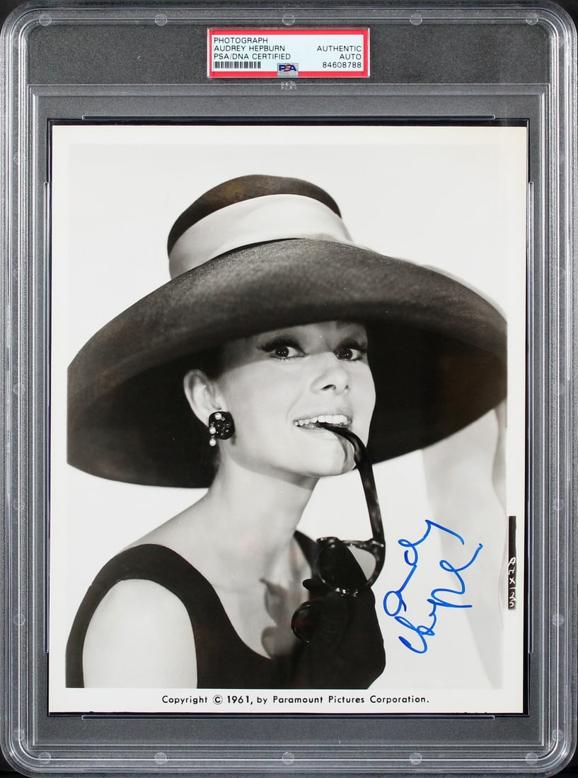 PSA Slabbed Audrey Hepburn 8x10 Signed Breakfast At Tiffany's Photo: PSA Slabbed Audrey Hepburn 8x10 Signed Breakfast At Tiffany's Photo This 8x10 photograph features an authentic autograph by Audrey Hepburn from the film Breakfast At Tiffany's. The photo has been slab