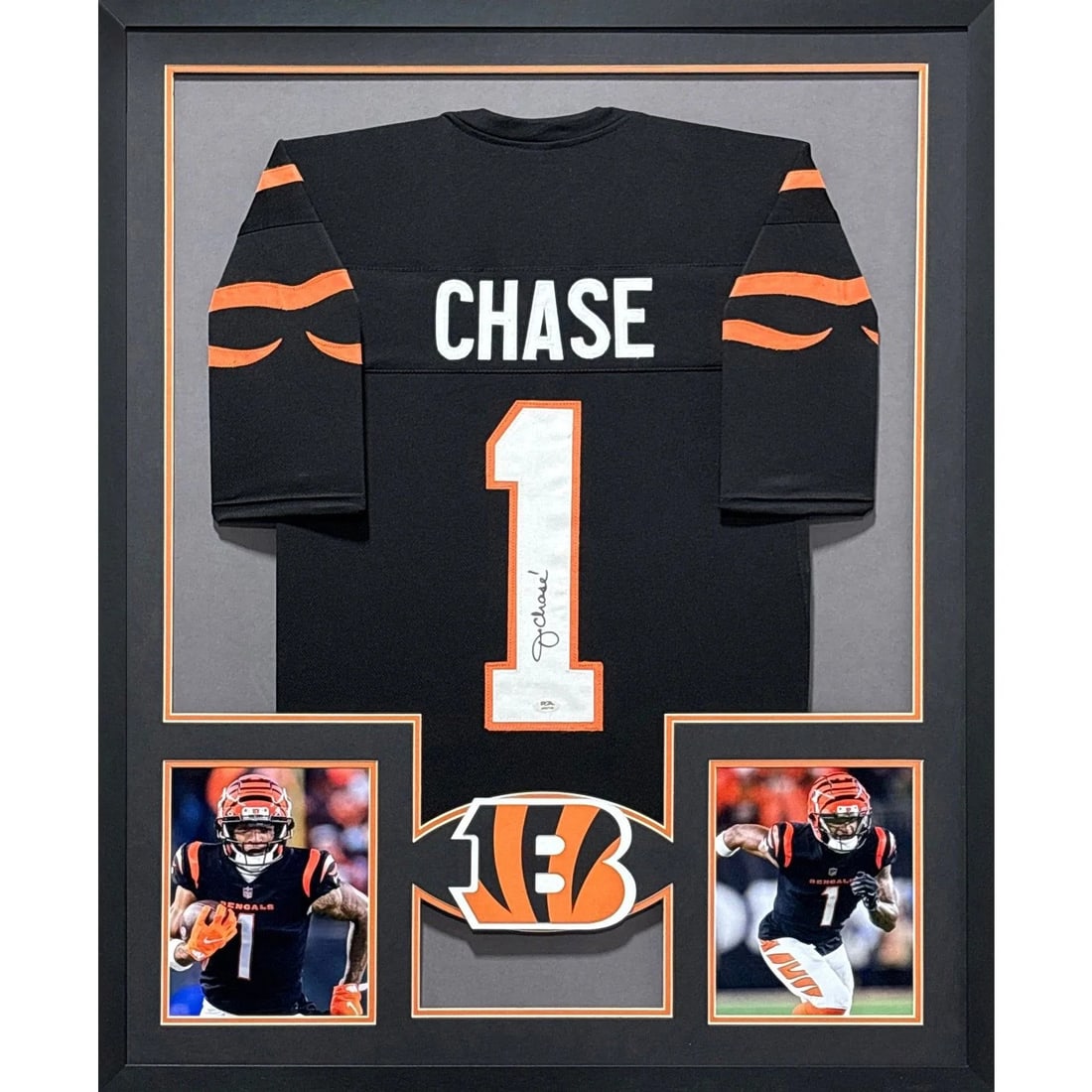 PSA authenticated framed Ja'Marr Chase Bengals jersey 42x34: PSA authenticated framed Ja'Marr Chase Bengals jersey 42x34 This framed Ja'Marr Chase jersey has been autographed and authenticated by PSA/DNA, featuring a tamper-proof sticker for verification. The j