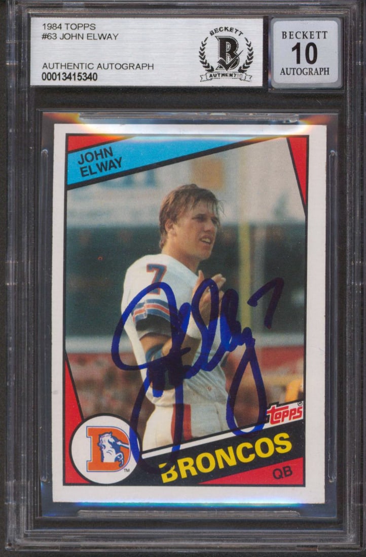John Elway Signed 1984 Topps Rookie Card Auto 10 BAS Slabbed: John Elway Signed 1984 Topps Rookie Card Auto 10 BAS Slabbed This is an original 1984 Topps #63 rookie card of John Elway, personally signed by the legendary quarterback of the Denver Broncos. The car