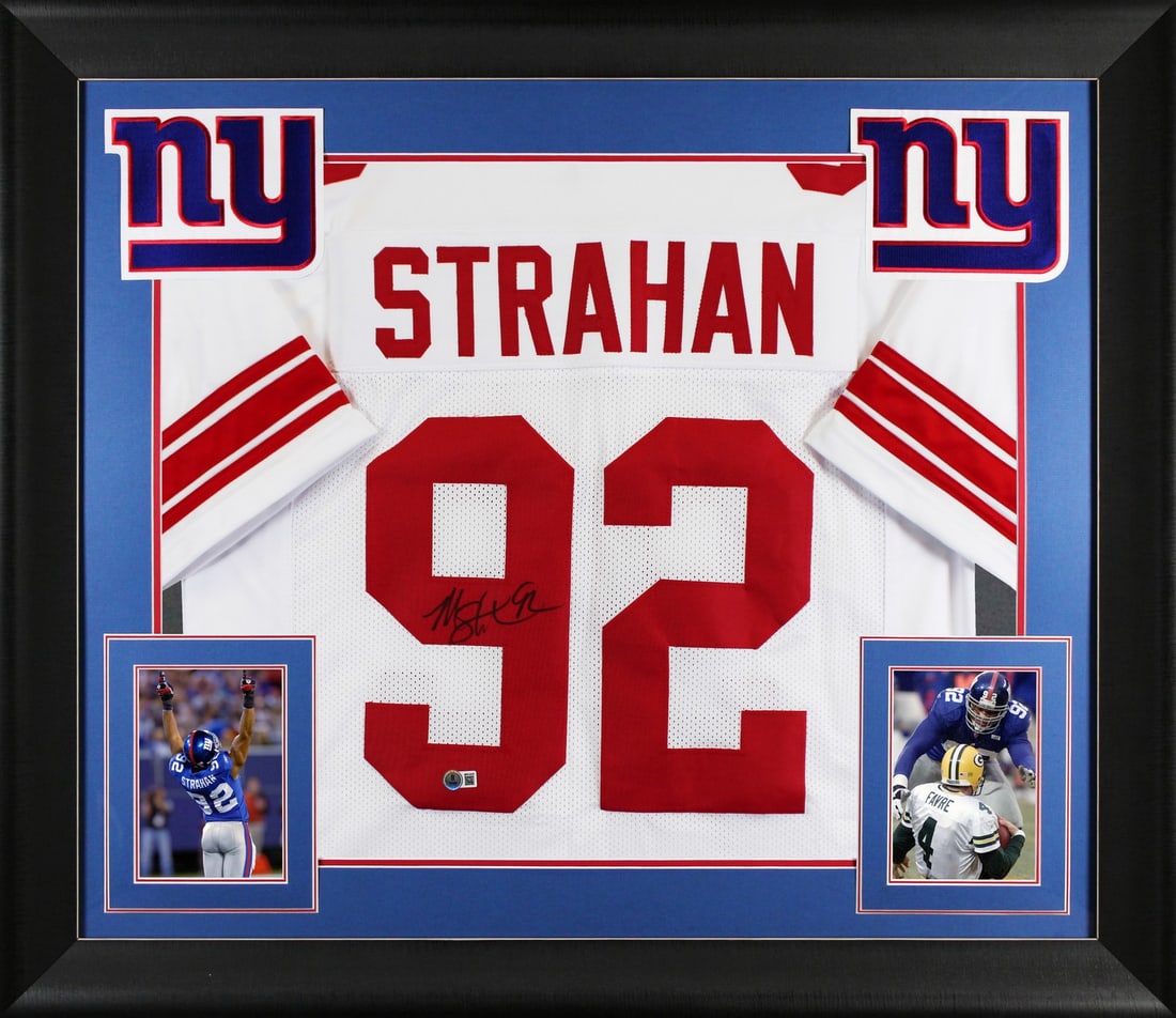 Framed Michael Strahan Signed White Jersey Beckett BAS Witnessed: Framed Michael Strahan Signed White Jersey Beckett BAS Witnessed This is an original autographed white pro style framed jersey personally signed by Michael Strahan of the New York Giants. It is a BAS 