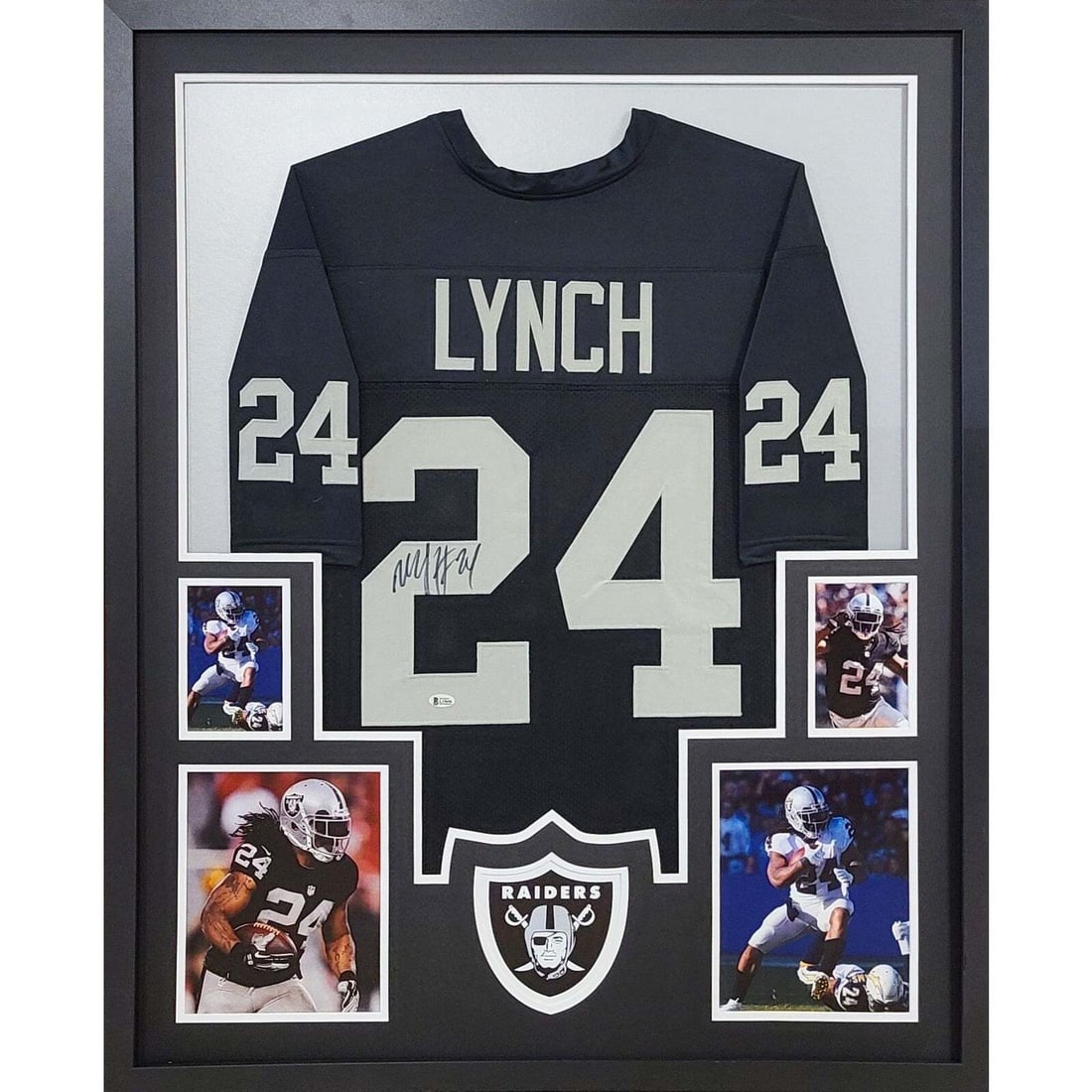 Marshawn Lynch Signed Raiders Jersey PSA/DNA Framed 42x34: Marshawn Lynch Signed Raiders Jersey PSA/DNA Framed 42x34 This autographed Marshawn Lynch framed jersey is a must-have for any Raiders fan. Authenticated by PSA/DNA, one of the leading names in sports