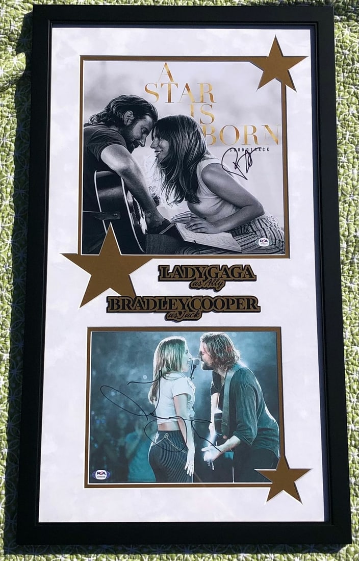 Lady Gaga Bradley Cooper A Star Is Born Signed Framed Photo PSA Certified: Lady Gaga Bradley Cooper A Star Is Born Signed Framed Photo PSA Certified This is an original framed photo display from the acclaimed movie A Star Is Born, featuring authentic signatures from both Lad