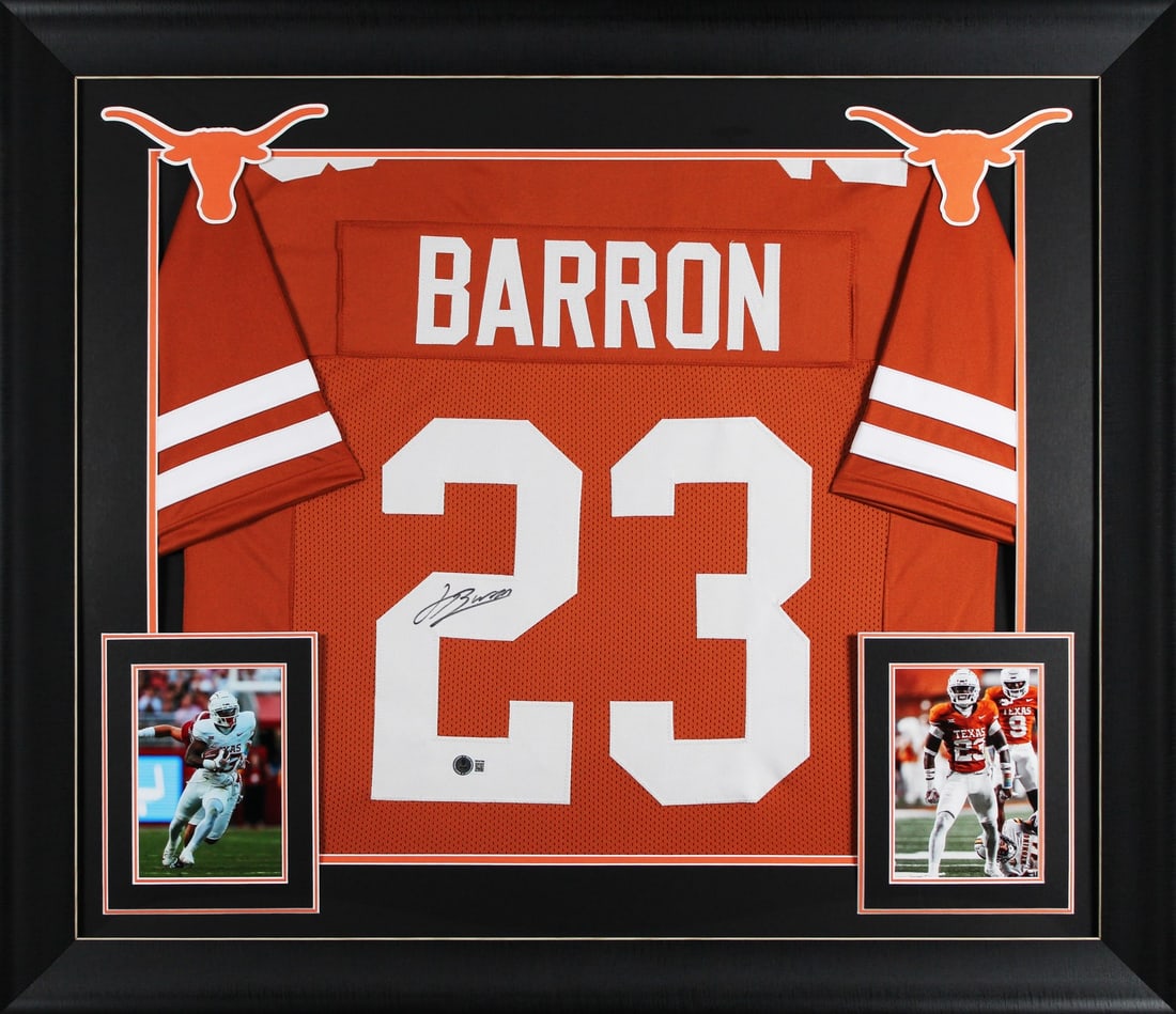 Jahdae Barron Autographed Texas Longhorns Framed Jersey Beckett Witnessed: Jahdae Barron Autographed Texas Longhorns Framed Jersey Beckett Witnessed This framed jersey features a burnt orange pro style jersey personally signed by Jahdae Barron of the Texas Longhorns. The aut