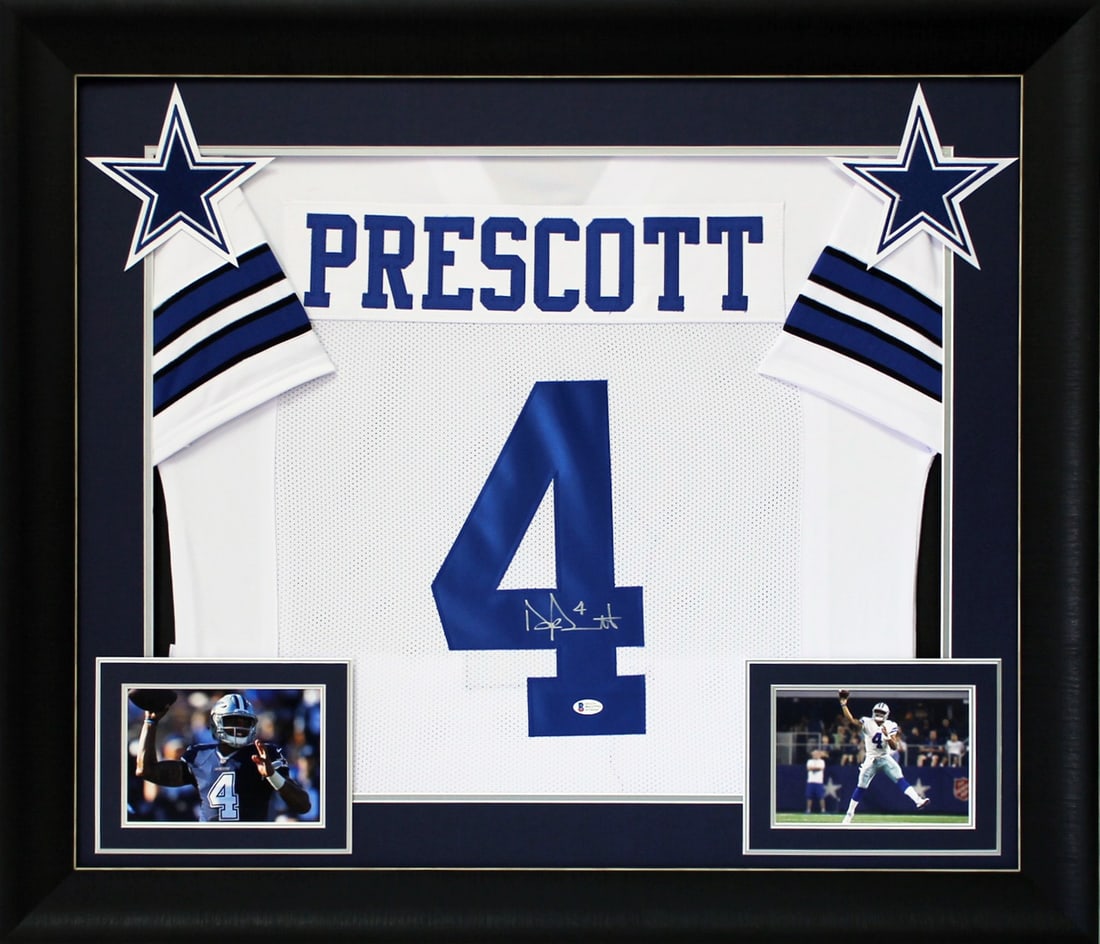 Framed White Pro Style Jersey Signed by Dak Prescott Beckett Witnessed: Framed White Pro Style Jersey Signed by Dak Prescott Beckett Witnessed This is an authentic signed white pro style framed jersey personally autographed by Dak Prescott of the Dallas Cowboys. It is an 