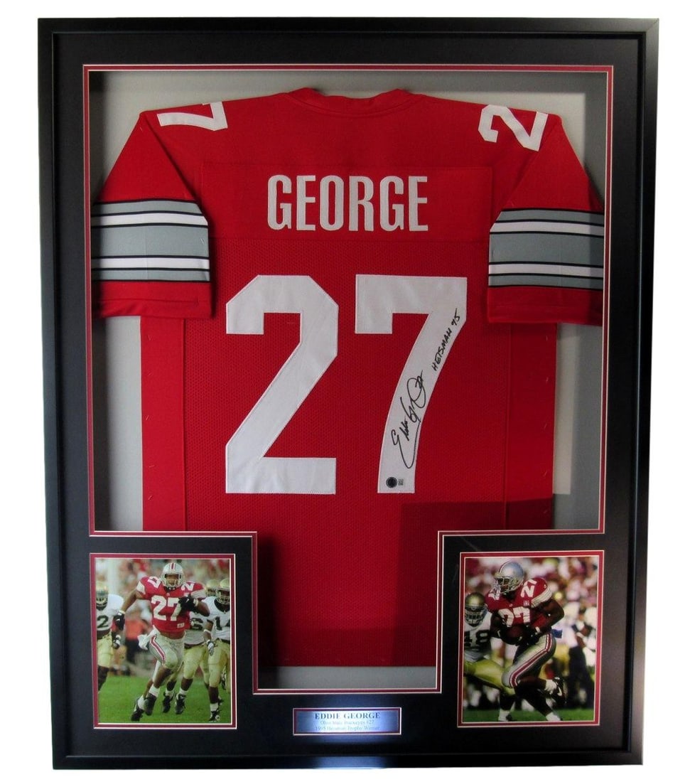 Framed Eddie George Signed Ohio State Jersey With Beckett COA and Inscription: Framed Eddie George Signed Ohio State Jersey With Beckett COA and Inscription This framed display features an Eddie George autographed and inscribed "Heisman 1995" Ohio State football jersey, accompan