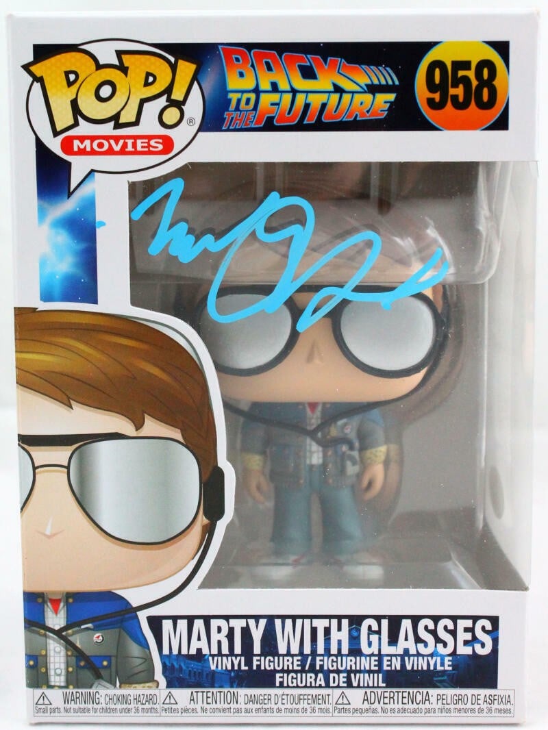 Funko Marty with Glasses Figure 958 signed by Michael J. Fox JSA: Funko Marty with Glasses Figure 958 signed by Michael J. Fox JSA Funko Pop figurine featuring Marty with glasses, autographed by Michael J. Fox. The item is pre-owned and made in Vietnam. Specificatio