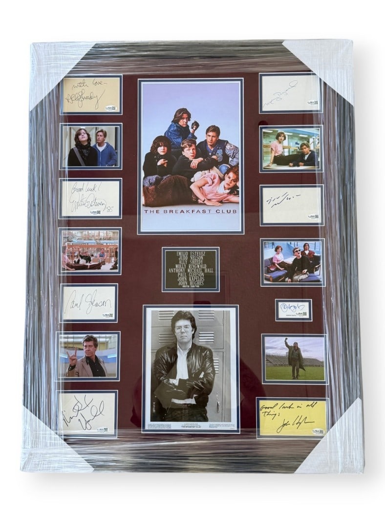 Framed Breakfast Club Cast Autographed Photo and Cut Signatures JSA Authenticated: Framed Breakfast Club Cast Autographed Photo and Cut Signatures JSA Authenticated This is a framed display featuring a photograph and autographed cuts from the film The Breakfast Club. The item is sig