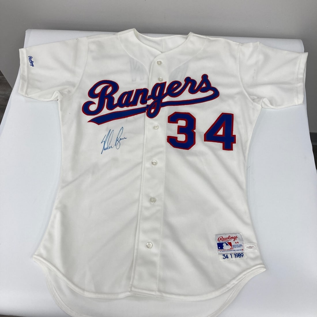 Nolan Ryan Signed 1989 Texas Rangers Jersey with JSA Sticker: Nolan Ryan Signed 1989 Texas Rangers Jersey with JSA Sticker This is an authentic 1989 Texas Rangers game model jersey signed by legendary baseball player Nolan Ryan. The jersey features a James Spenc