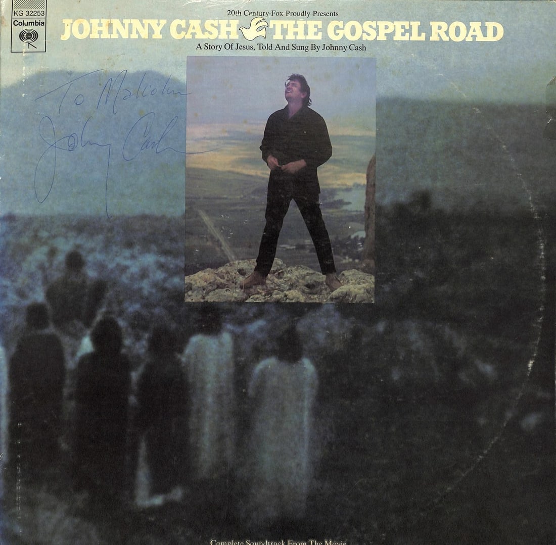 Johnny Cash autographed The Gospel Road LP cover Beckett inscribed To Malcolm: Johnny Cash autographed The Gospel Road LP cover Beckett inscribed To Malcolm This is an original vinyl LP album cover for "The Gospel Road," hand-signed and inscribed "To Malcolm" by Johnny Cash. The