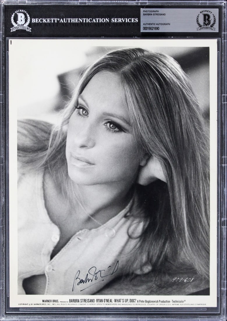 Beckett Slabbed Barbra Streisand 8x10 What's Up Doc? Signed Photo: Beckett Slabbed Barbra Streisand 8x10 What's Up Doc? Signed Photo This is an original 8x10 promotional photograph personally signed by Barbra Streisand from the film "What's Up, Doc?" The autograph ha