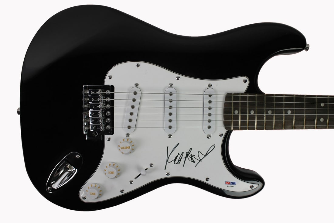 PSA Authenticated Kate Nash Signed Black Electric Guitar: PSA Authenticated Kate Nash Signed Black Electric Guitar This black electric guitar has been personally signed by Kate Nash and comes with PSA/DNA certification documentation, including a matching num