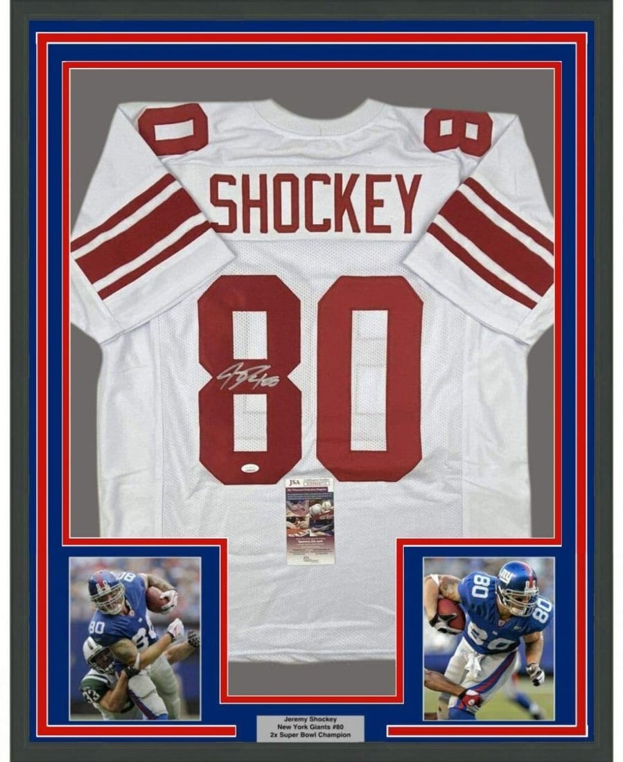 Framed Jeremy Shockey signed Giants jersey JSA COA 33x42: Framed Jeremy Shockey signed Giants jersey JSA COA 33x42 This professionally framed and matted New York Giants white jersey features the authentic signature of Jeremy Shockey. The display includes two
