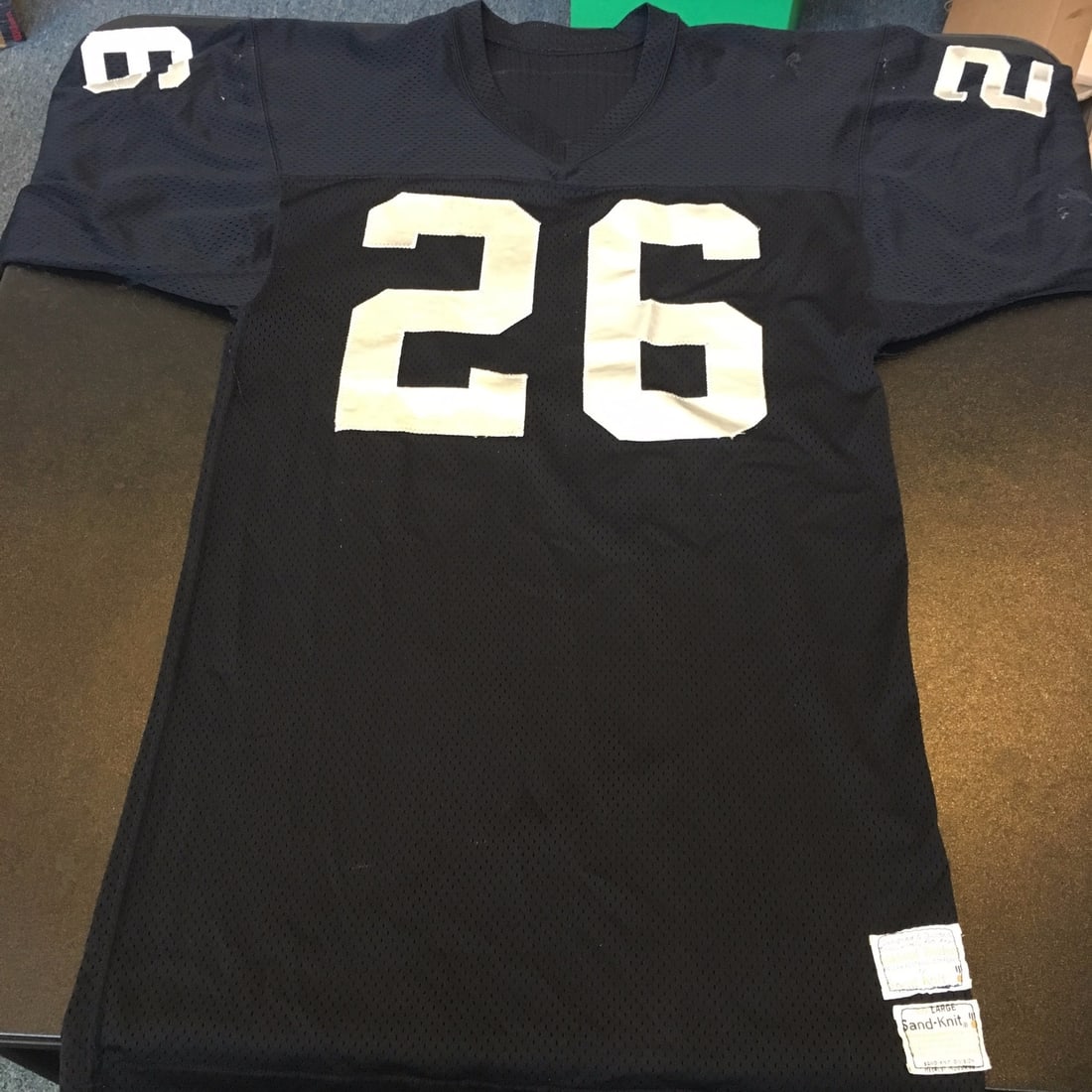 1974 Oakland Raiders Skip Thomas Game Worn Jersey With Dual COAs: 1974 Oakland Raiders Skip Thomas Game Worn Jersey With Dual COAs This is an authentic 1974 Oakland Raiders game-used jersey worn by Skip Thomas, known as "Dr. Death." The jersey exhibits heavy signs o