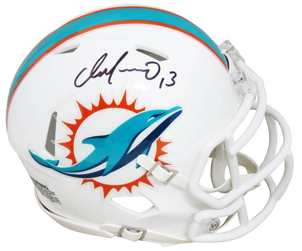 Dan Marino Signed Miami Dolphins Mini Helmet with COA: Dan Marino Signed Miami Dolphins Mini Helmet with COA This is a Dan Marino signed Miami Dolphins Riddell Speed mini helmet, a must-have collectible for any football fan. This original item features th