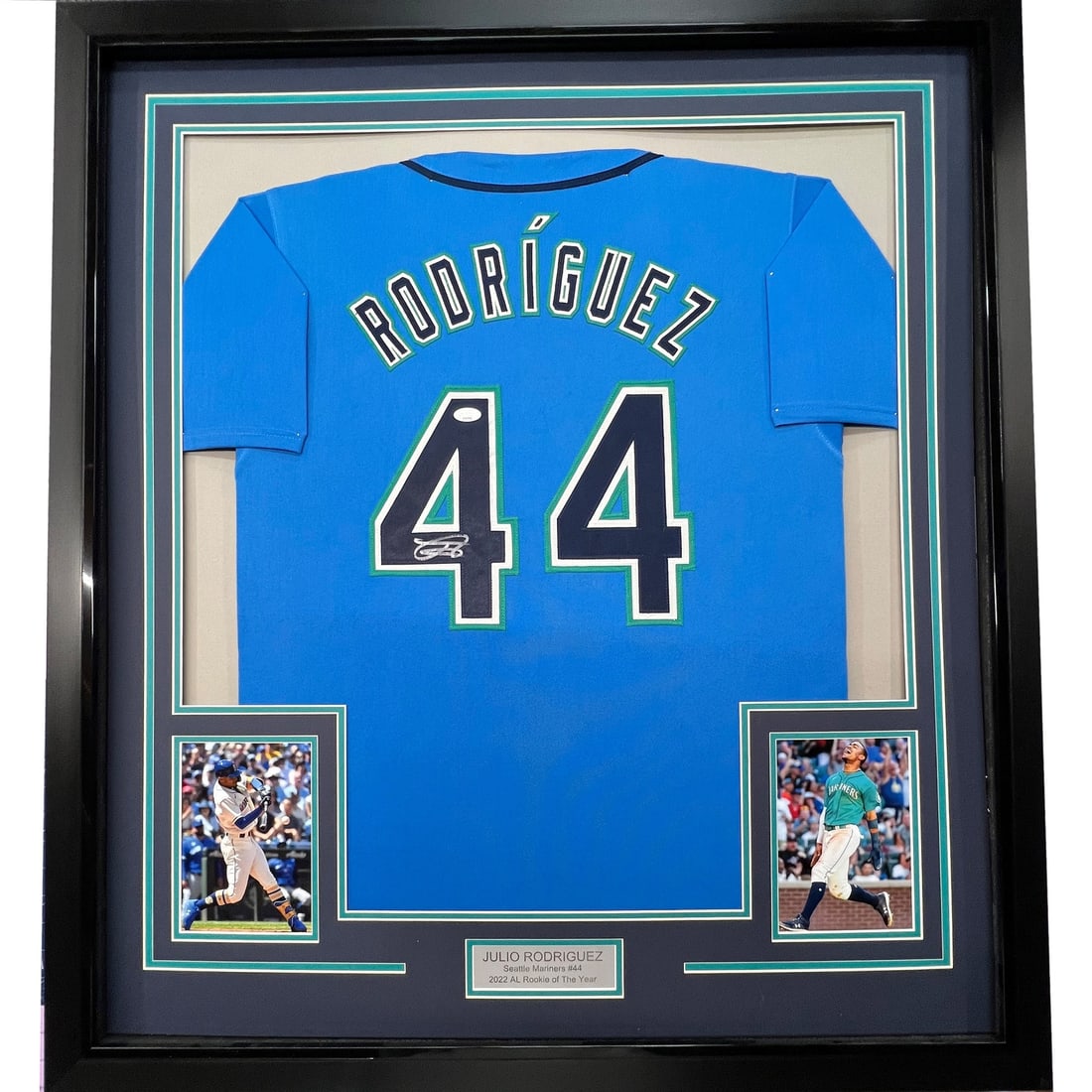 Framed Julio Rodriguez Autographed Light Blue Jersey JSA COA MLB: Framed Julio Rodriguez Autographed Light Blue Jersey JSA COA MLB This framed autographed jersey features Julio Rodriguez of the Seattle Mariners, showcasing his signature on a light blue jersey. The i