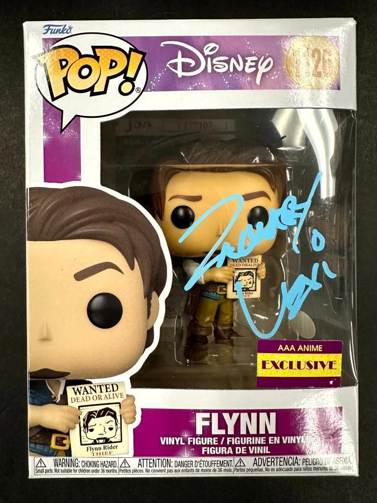 Flynn Funko Pop signed by Zachary Levi JSA authenticated Tangled collectible: Flynn Funko Pop signed by Zachary Levi JSA authenticated Tangled collectible This rare Disney Tangled Funko Pop! figure, number 1126, depicts the character Flynn and is personally signed by Zachary Le