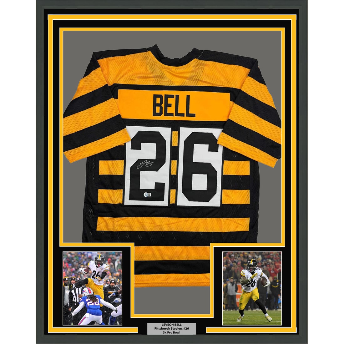 Le'Veon Bell Signed Steelers Jersey 35x39 Framed with JSA Authentication: Le'Veon Bell Signed Steelers Jersey 35x39 Framed with JSA Authentication This framed Le'Veon Bell Pittsburgh Steelers jersey features an authentic autograph and is professionally matted and framed. Th