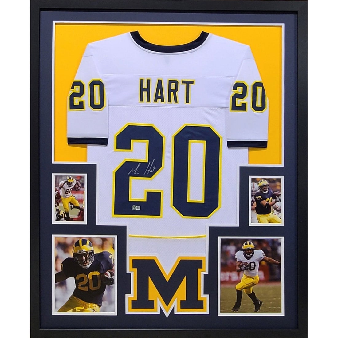 Framed Michigan Football Jersey Signed by Mike Hart with Beckett Authentication: Framed Michigan Football Jersey Signed by Mike Hart with Beckett Authentication This is an original Michigan football jersey autographed by Mike Hart, presented in a professionally framed display. The
