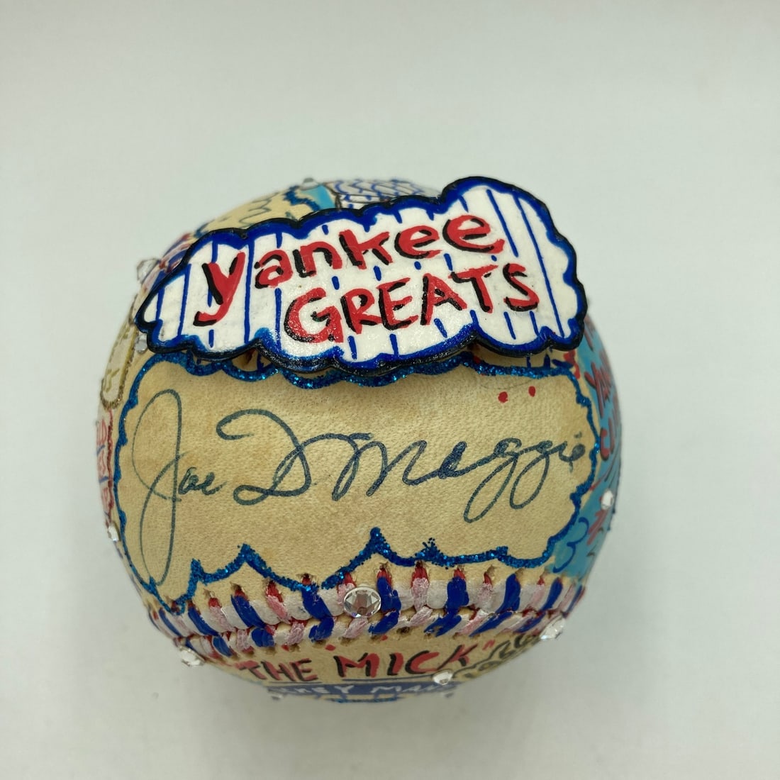 PSA authenticated Fazzino art baseball signed by Mantle and DiMaggio: PSA authenticated Fazzino art baseball signed by Mantle and DiMaggio This unique baseball is a collaboration between celebrated sports artist Charles Fazzino and baseball legends Mickey Mantle and Joe