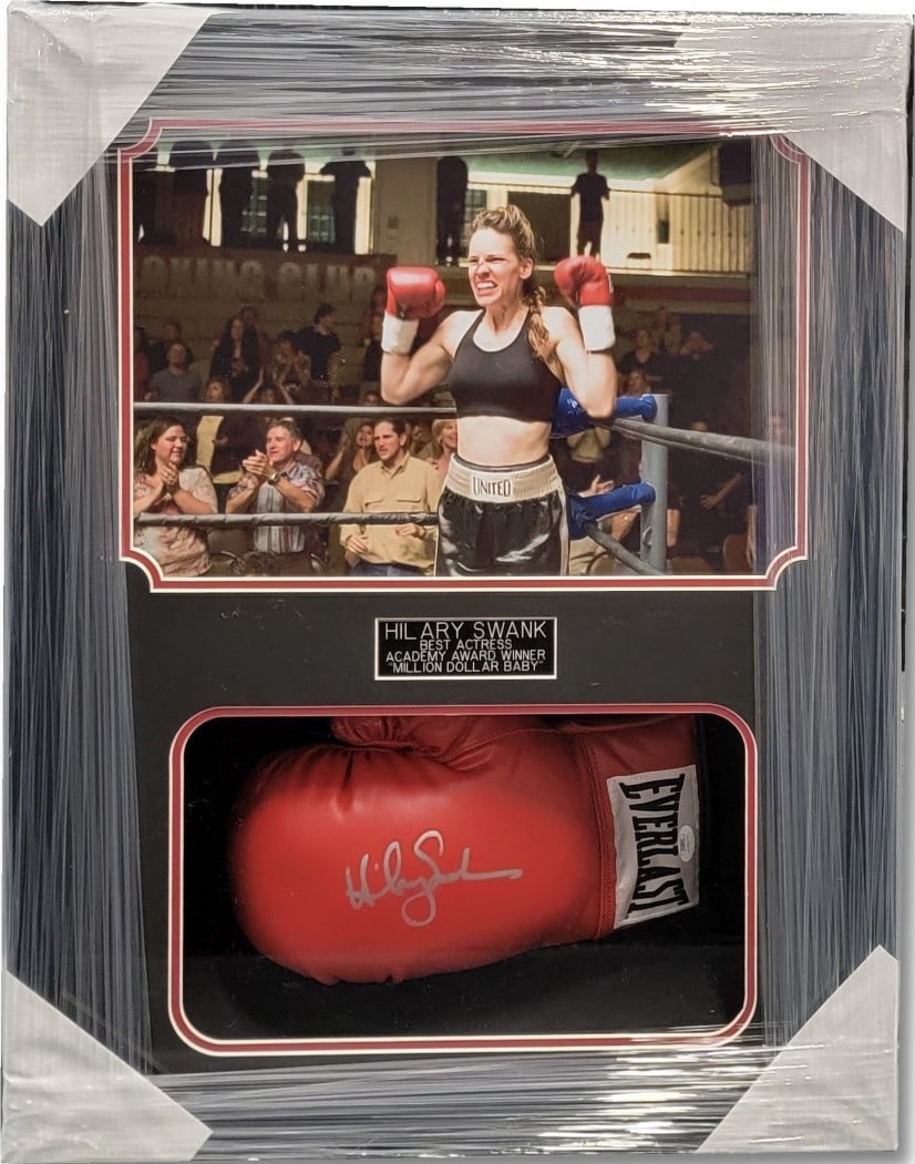 Custom Framed Boxing Glove Signed by Hillary Swank Million Dollar Baby JSA Authenticated: Custom Framed Boxing Glove Signed by Hillary Swank Million Dollar Baby JSA Authenticated This custom framed boxing glove is autographed by Hillary Swank and commemorates her role in the film "Million 