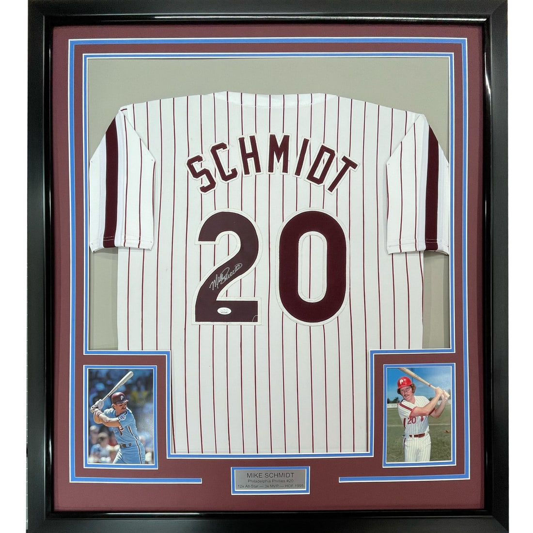 Framed Mike Schmidt Autographed Pinstripe Jersey 33x42 JSA COA: Framed Mike Schmidt Autographed Pinstripe Jersey 33x42 JSA COA This professionally framed and matted item features an autographed Mike Schmidt pinstripe jersey, measuring 33" x 42". The jersey is auth