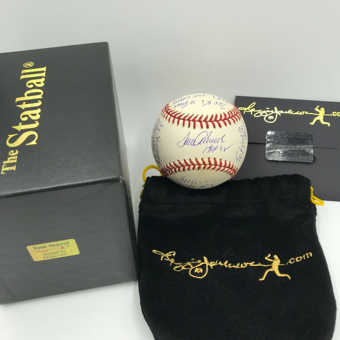 Tom Seaver signed career stat baseball with Reggie Jackson COA (1 of 11)