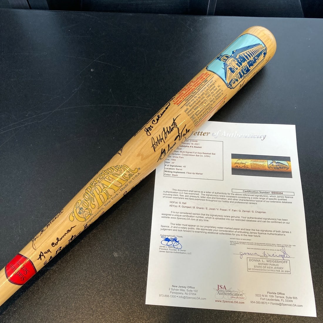 Rare Philadelphia Athletics Alumni Bat with 40 Signatures JSA COA: Rare Philadelphia Athletics Alumni Bat with 40 Signatures JSA COA This rare Philadelphia Athletics commemorative bat, produced by the Cooperstown Bat Company, features an impressive collection of 40 s