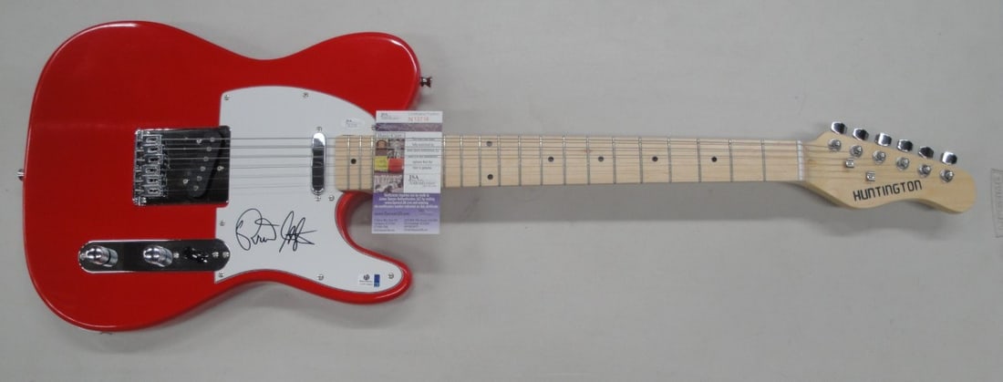 Brian Setzer Signed Electric Guitar JSA Authenticated: Brian Setzer Signed Electric Guitar JSA Authenticated This is a pre-owned electric guitar autographed by the legendary Brian Setzer, known for his rockabilly style and energetic performances. The auto