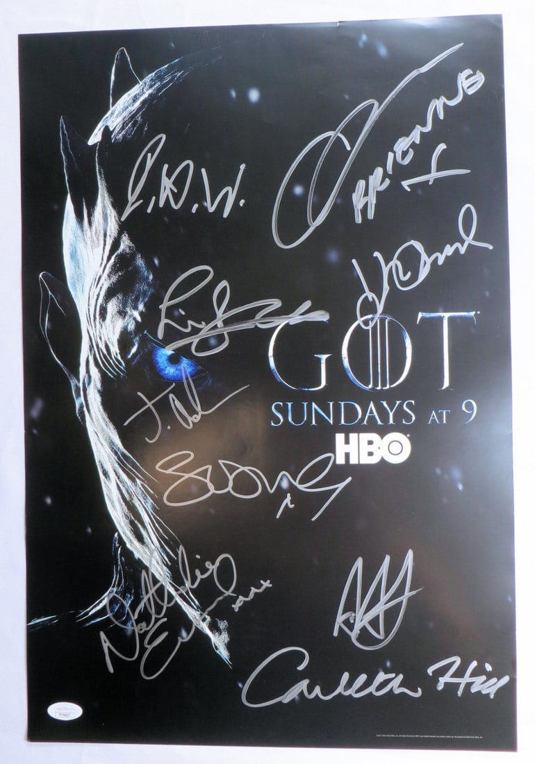 JSA Authenticated Game of Thrones Cast Signed Poster 9 Autographs 13.5 x 19: JSA Authenticated Game of Thrones Cast Signed Poster 9 Autographs 13.5 x 19 This is an original Game of Thrones poster autographed by nine cast members, including Sophie Turner, Liam Cunningham, John 
