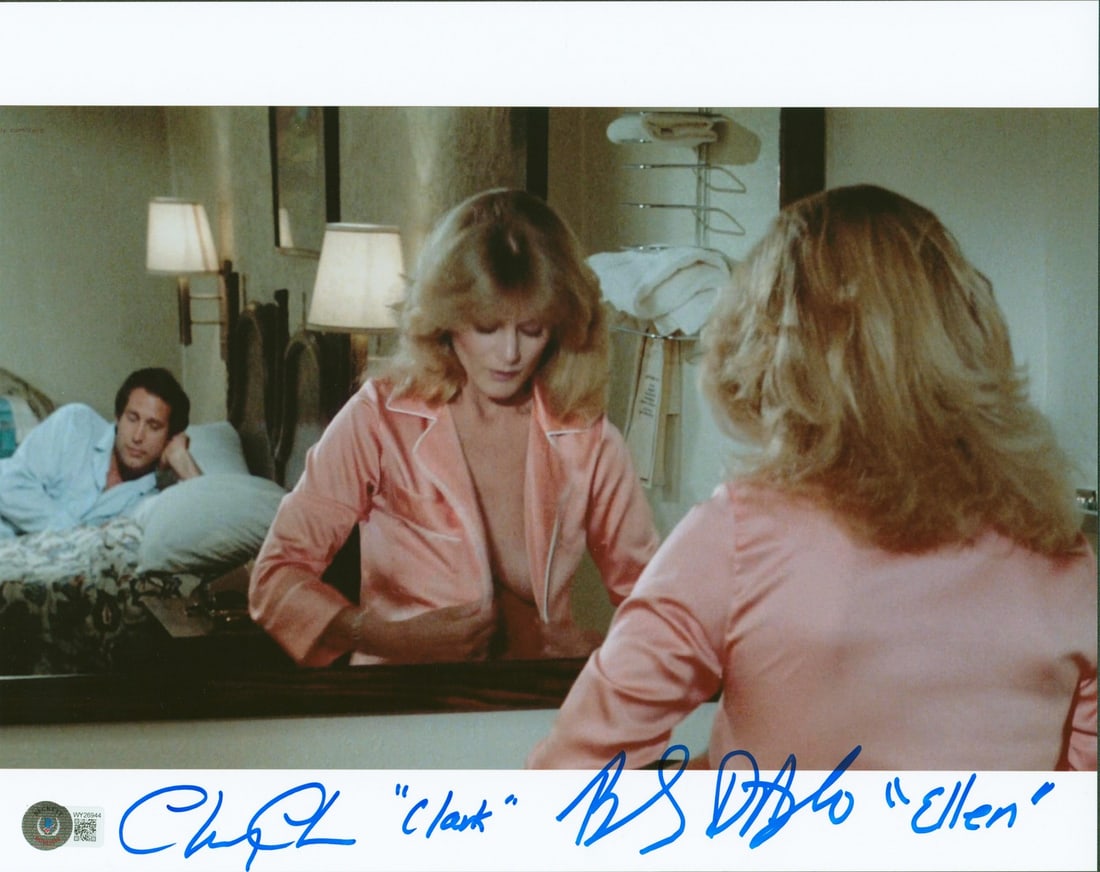 11x14 Photo Signed by Chevy Chase and Beverly D'Angelo Beckett Authenticated: 11x14 Photo Signed by Chevy Chase and Beverly D'Angelo Beckett Authenticated This is an 11x14 photograph signed by Chevy Chase and Beverly D'Angelo, who portrayed Clark and Ellen in National Lampoon's